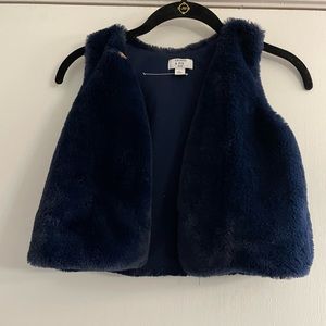 Navy child’s fur vest.